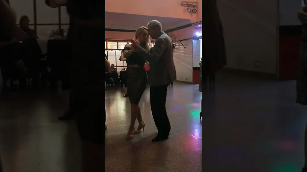 Video thumbnail for tango dance at dance floor of Buenos Aires milonga. Carlos Neuman and Veronica